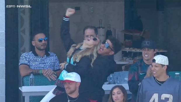 Patrick and Brittany Mahomes celebrate a goal by the Kansas City Current.